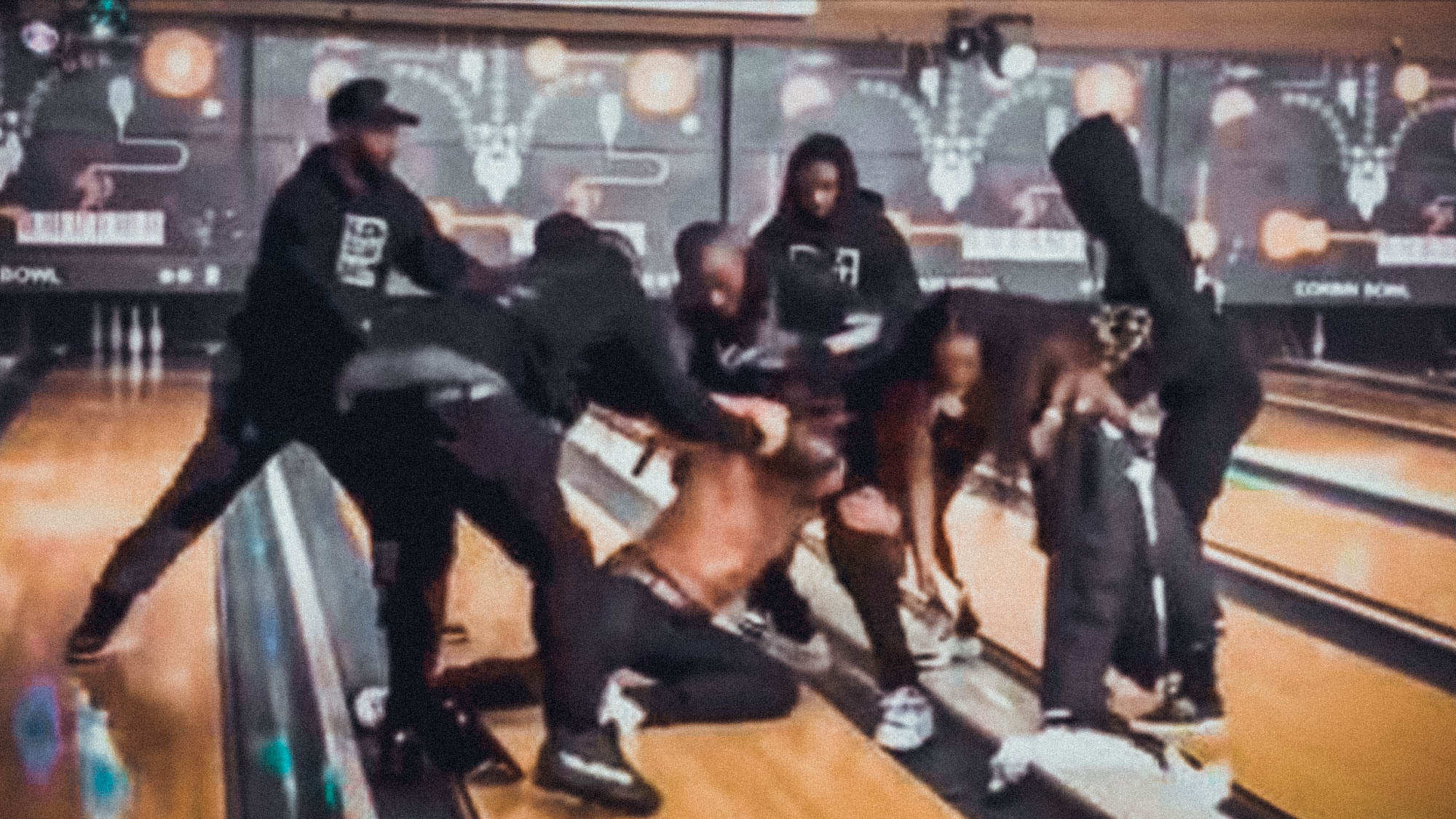 DaBaby and DaniLeigh's brother get into a physical fight at Bowling Alley