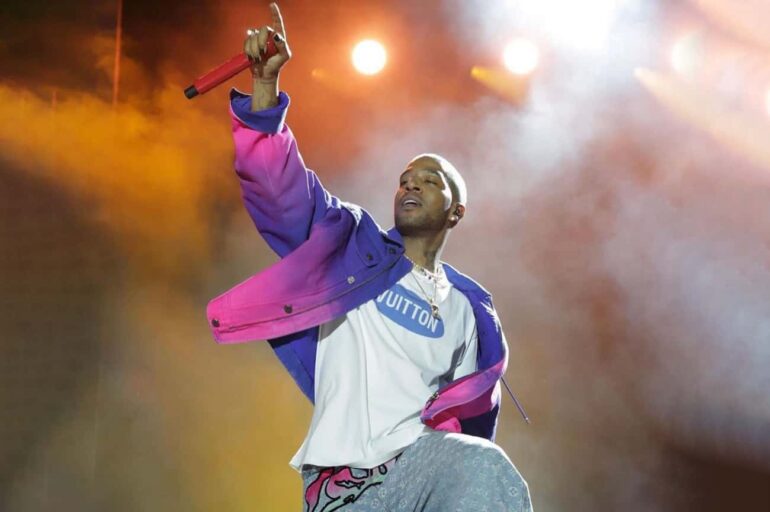 During Kid Cudi's Performance, Kanye Fans Threw Objects At Him