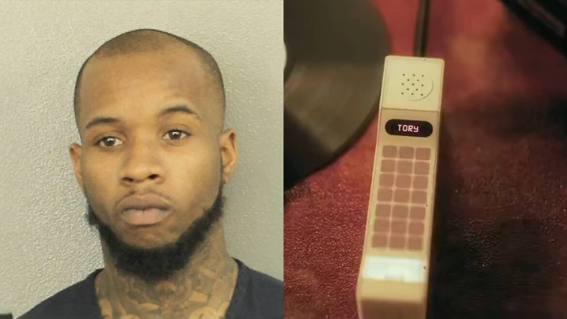 Tory Lanez making a phone call from prison