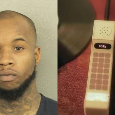 Tory Lanez making a phone call from prison