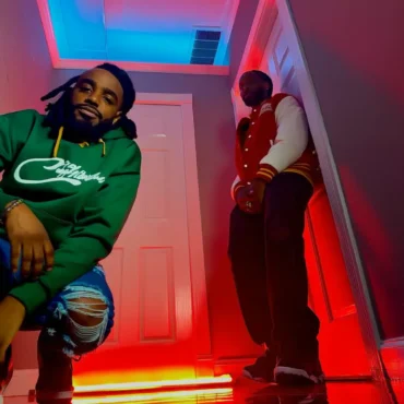 Jnt Prjct members P. Matics and Lamarzbars in a hallway with red and blue lights for HOYK single.